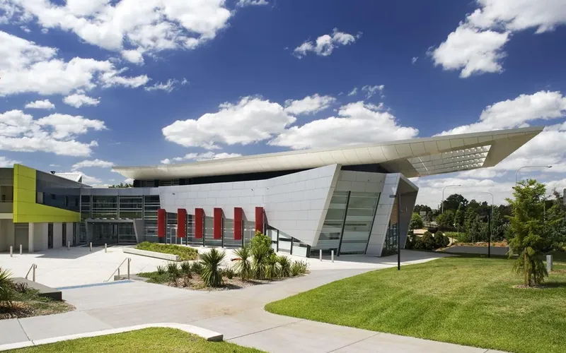 A modern civic and arts building with an angular roof in Campbelltown.
